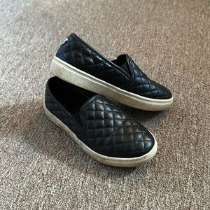 Girls black quilted slip-on shoes